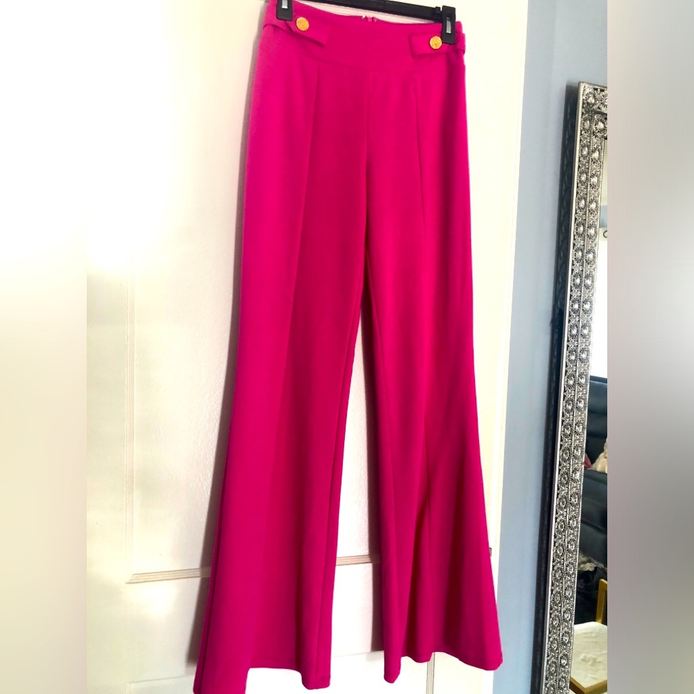 Pink wide leg slacks .